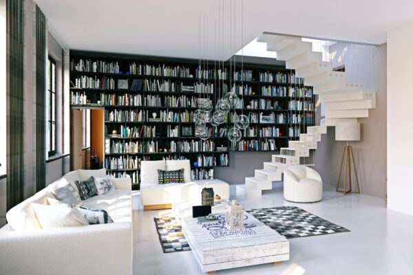 Biblioteca din living revine în amenajări. Cum o integrezi într-un decor modern